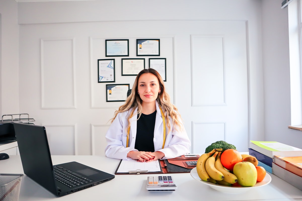 Person preparing healthy snacks with nuts, fruits, and whole grain options